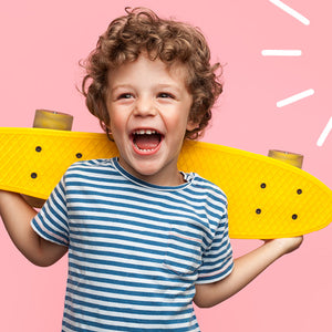 young boy with skateboard